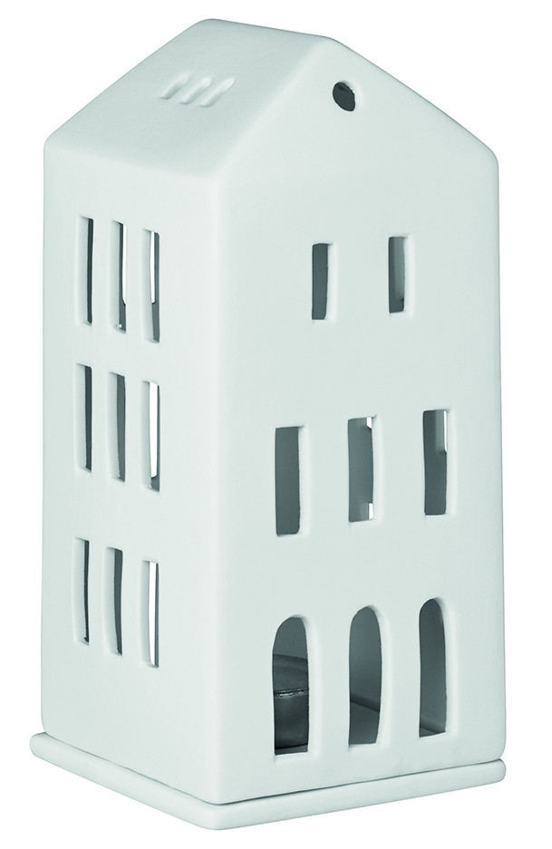 Detailaufnahme eines weißen Räder Lichthaus aus der Zuhause Kollektion mit Teelicht.