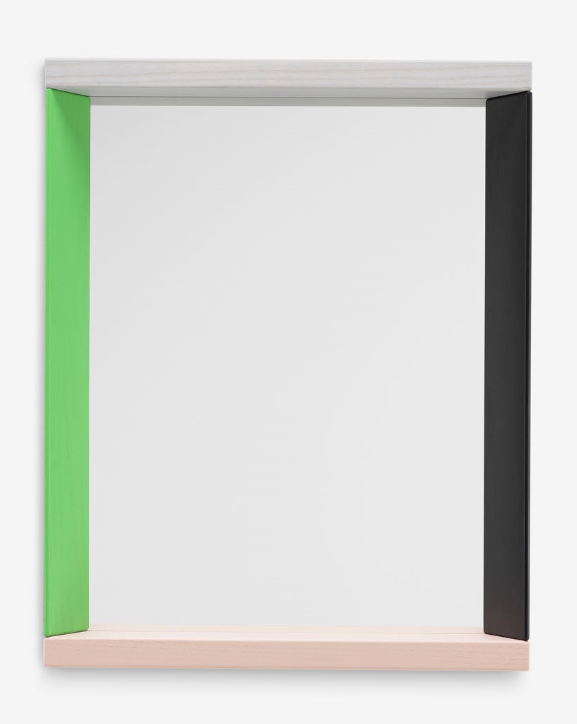 Vitra Colour Frame Spiegel mit farbigem Rahmen in Grün, Schwarz, Weiß und Rosa.