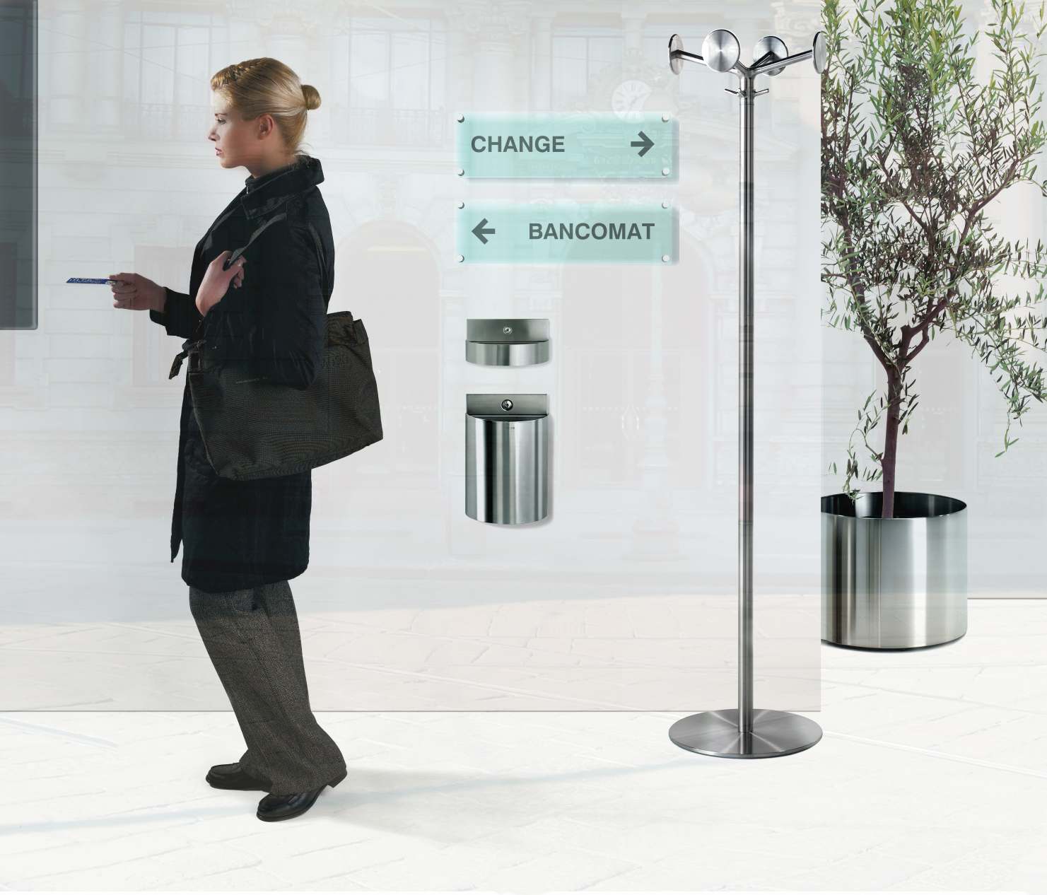Nox Flora Blumentopf von Rexite aus Edelstahl mit Olivenbaum, ideal für Innenräume und Büros.