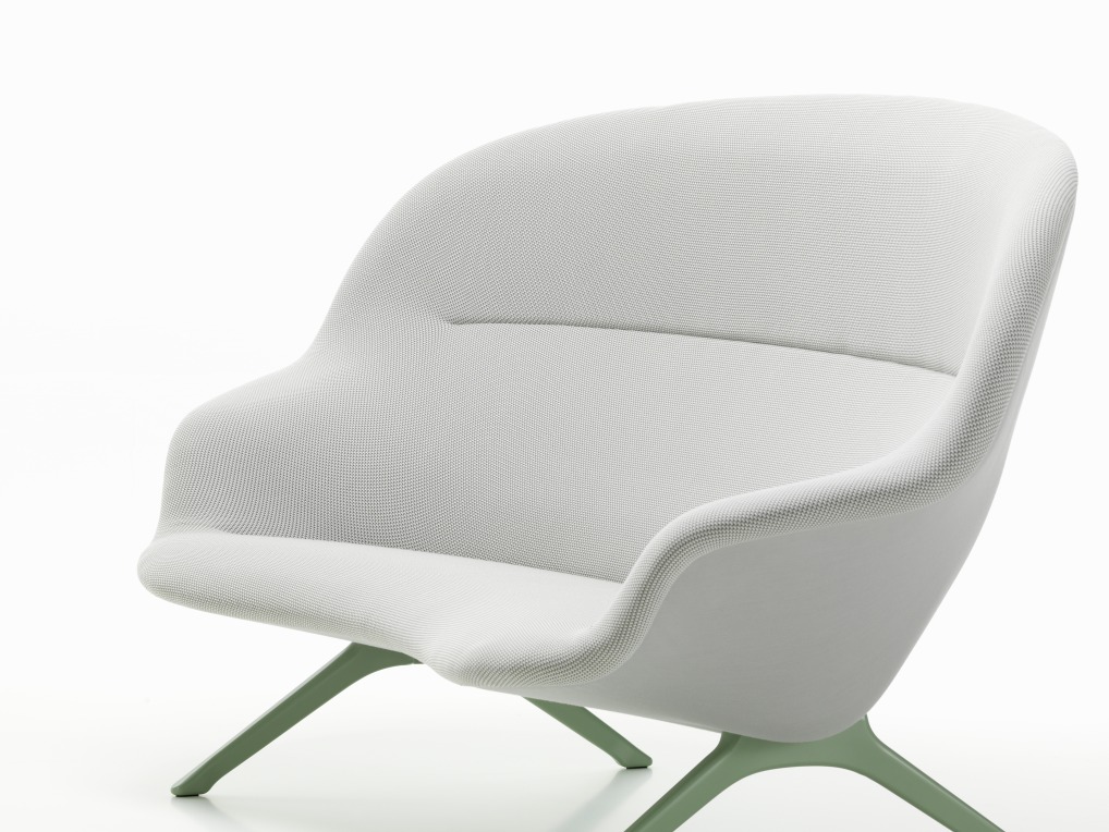 Abalon Sofa von Vitra, moderner Sessel mit weißem Stoffbezug und grünem Fußgestell.