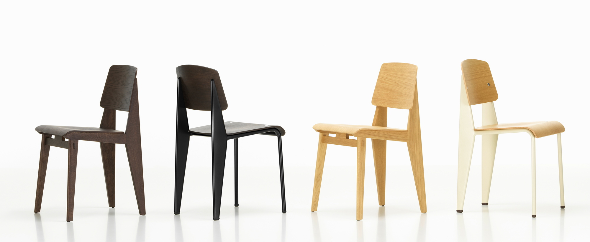 Vitra Chaise Tout Bois Stühle in verschiedenen Holzfarben, modernes Design für Esszimmer und Wohnbereich.
