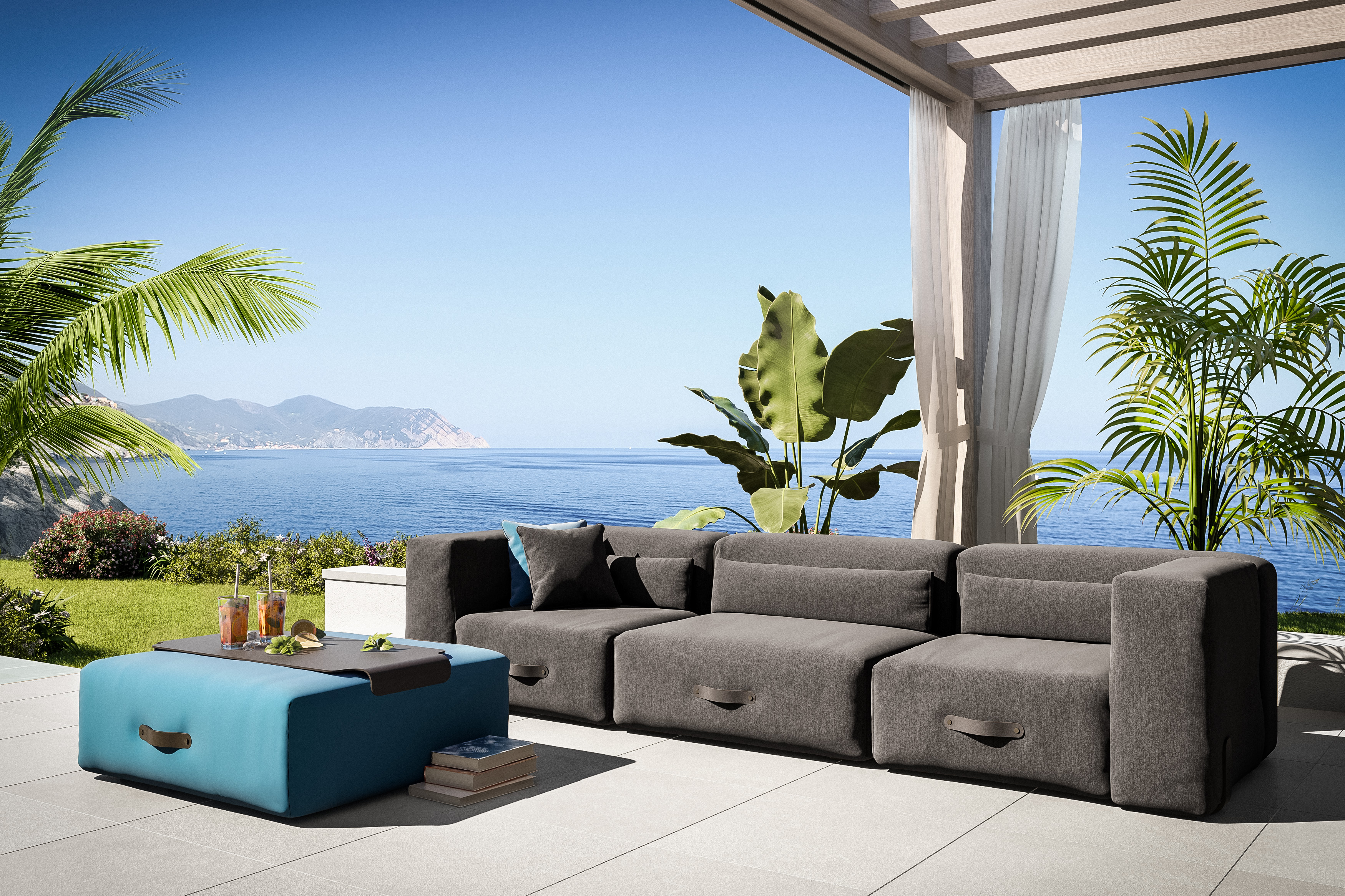 Miami Outdoor Sofa Lounger Taupe von Conmoto mit Meerblick, moderne Gartenmöbel und Lounge-Atmosphäre.