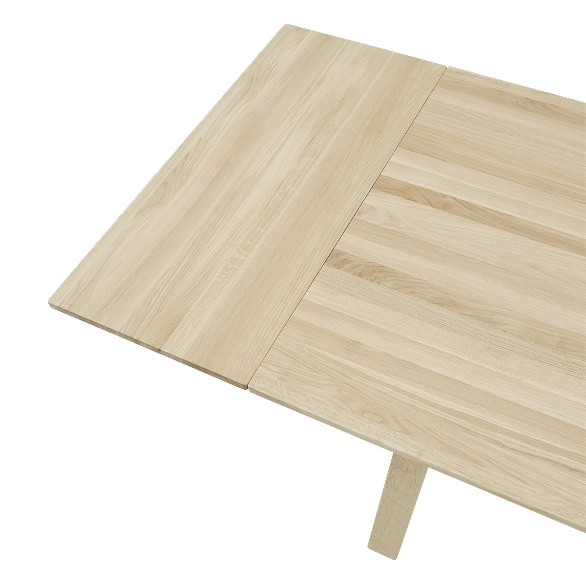 Detailaufnahme des Muuto Earnest Esstisch ausziehbar mit hellen Holzmaserungen und Ausziehfunktion.