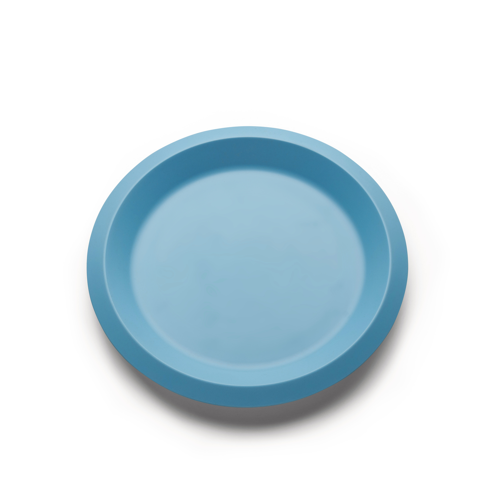 Blauer Alessi Kinderteller aus der Giro Kids Collection, modernes Design für Kindermahlzeiten.