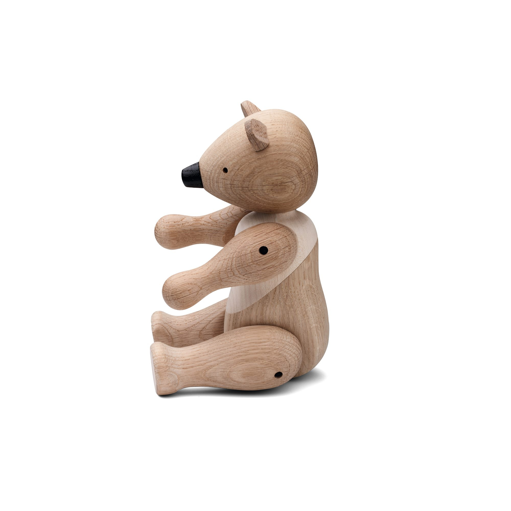 Kay Bojesen Bär Holzfigur, mittelgroß, aus hellem Holz, sitzend dargestellt. Dekoratives Holzspielzeug.