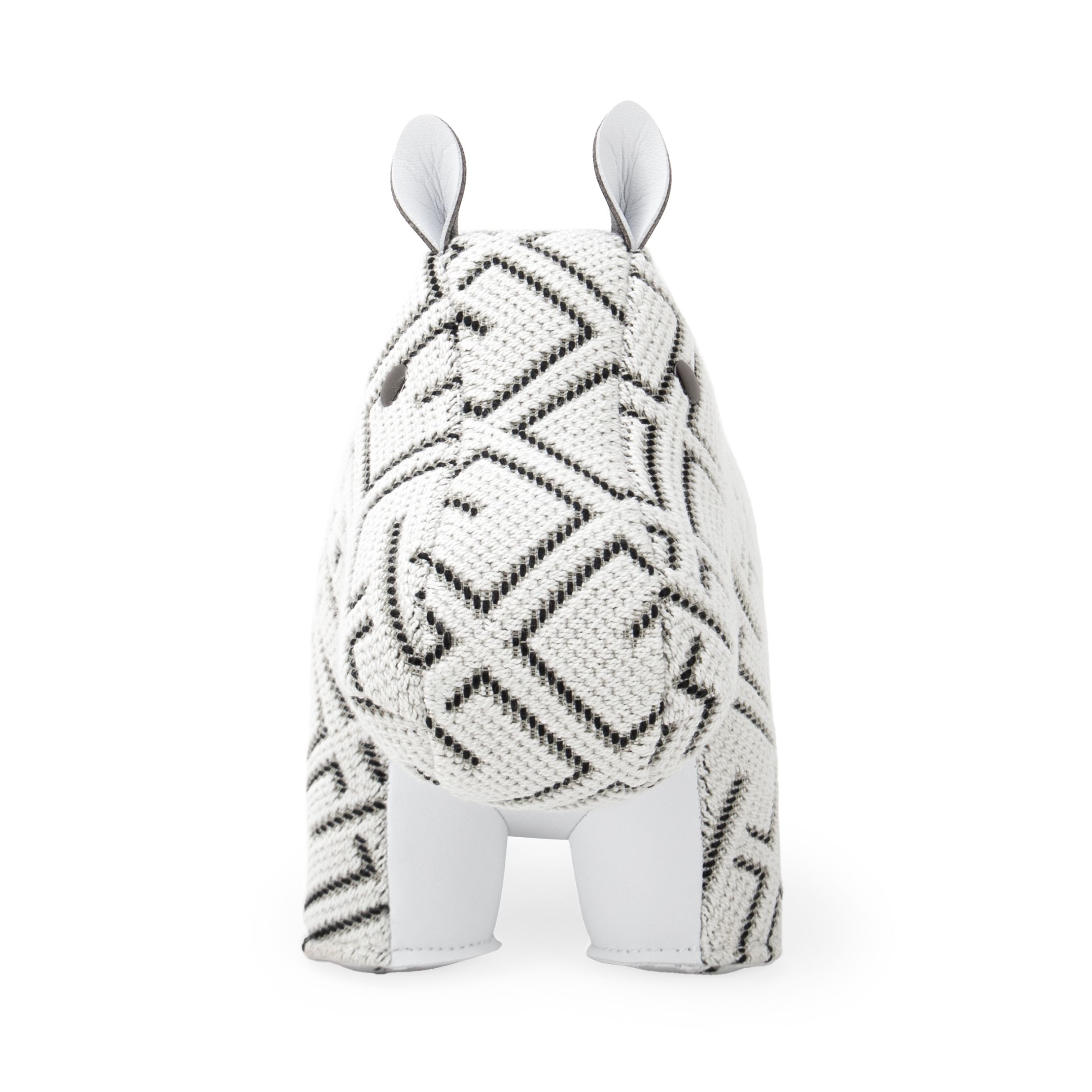 Weiße Hippo Buchstütze mit geometrischem Muster, Stoffbezug und Lederakzenten, Zuny x KVADRAT Design.