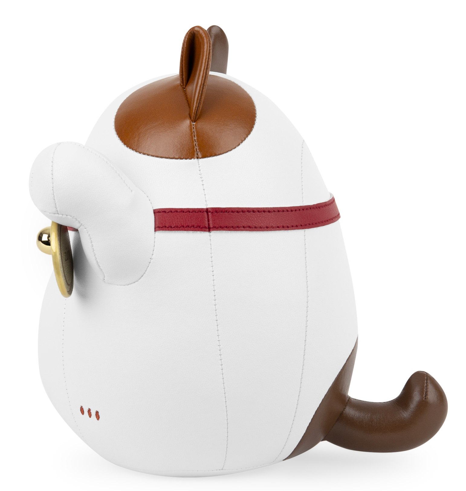 Weiße Lucky Cat Buchstütze aus Leder mit braunen Akzenten und goldenem Glöckchen.