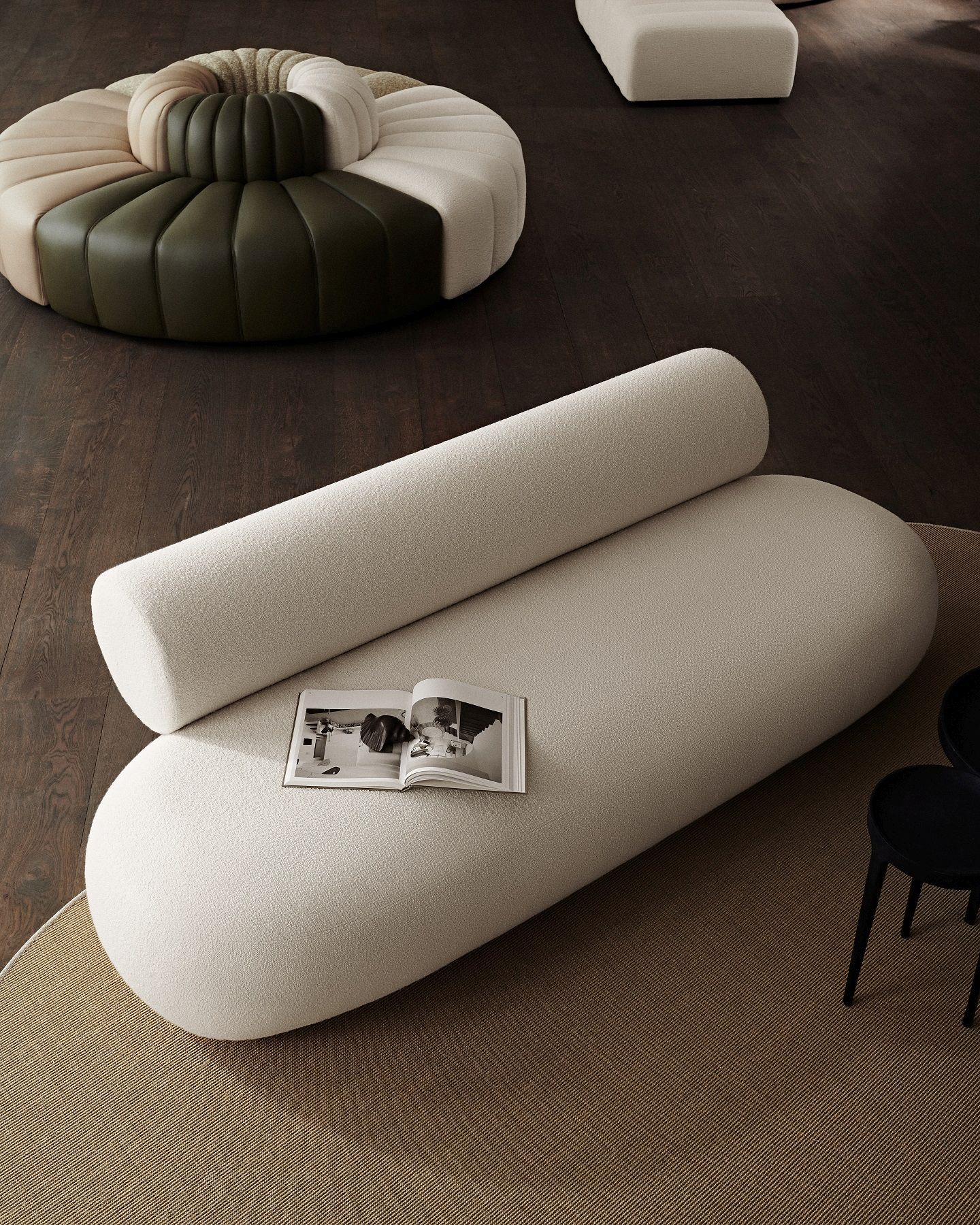 Beige Hippo Sofa von Norr11 mit runder Rückenlehne und Magazin auf beigem Teppich.