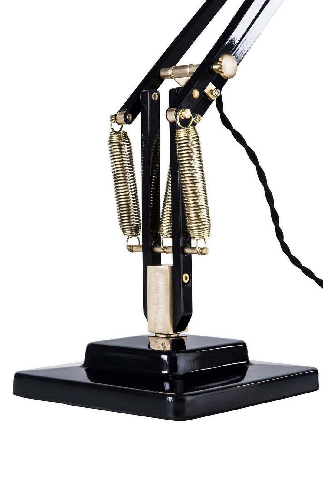 Detailaufnahme der Original 1227 Anglepoise Tischleuchte aus Messing mit schwarzem Gestell und Federn.