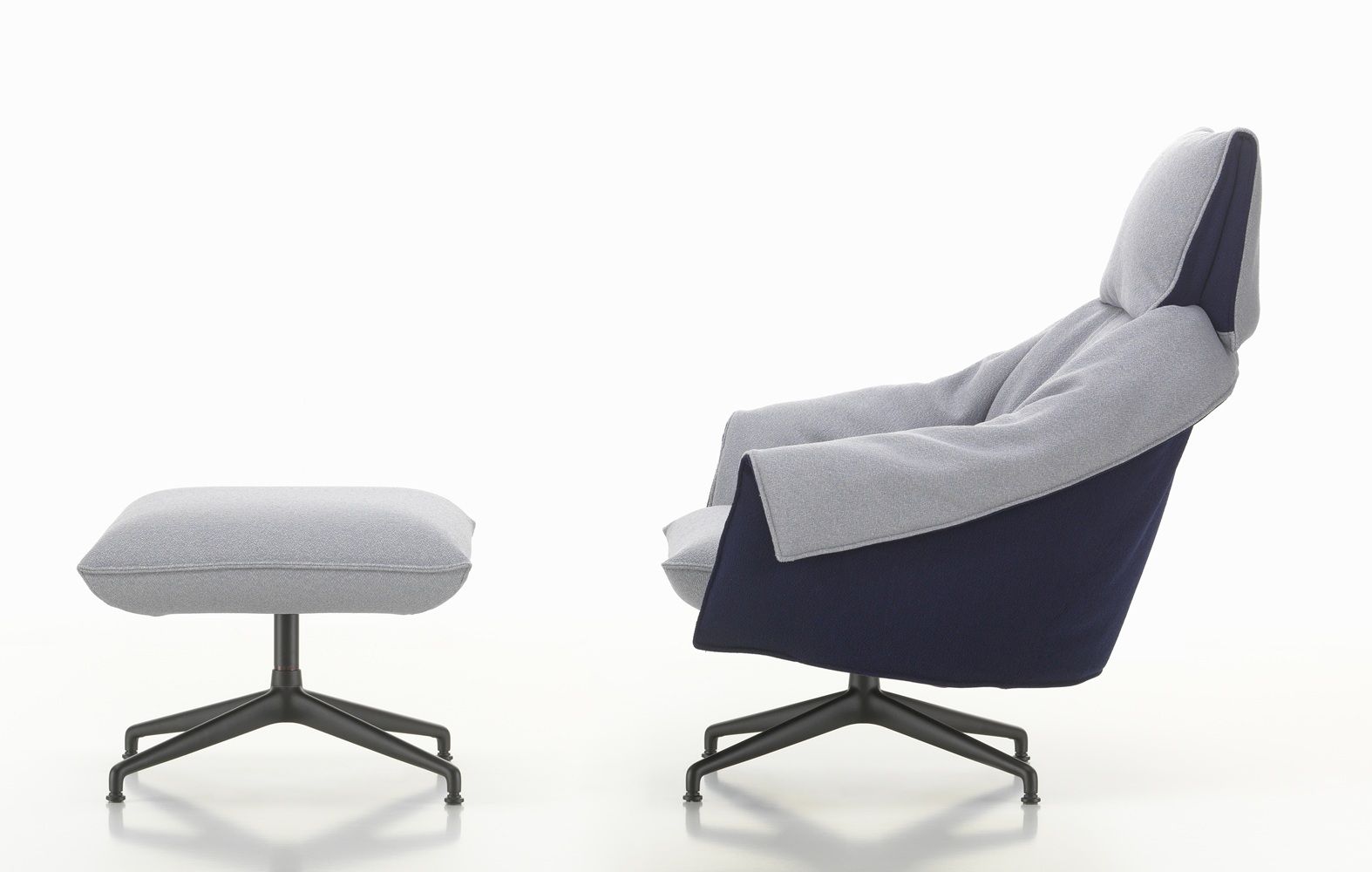 Bascule Fauteuil met hoge rugleuning en voetenbank Vitra