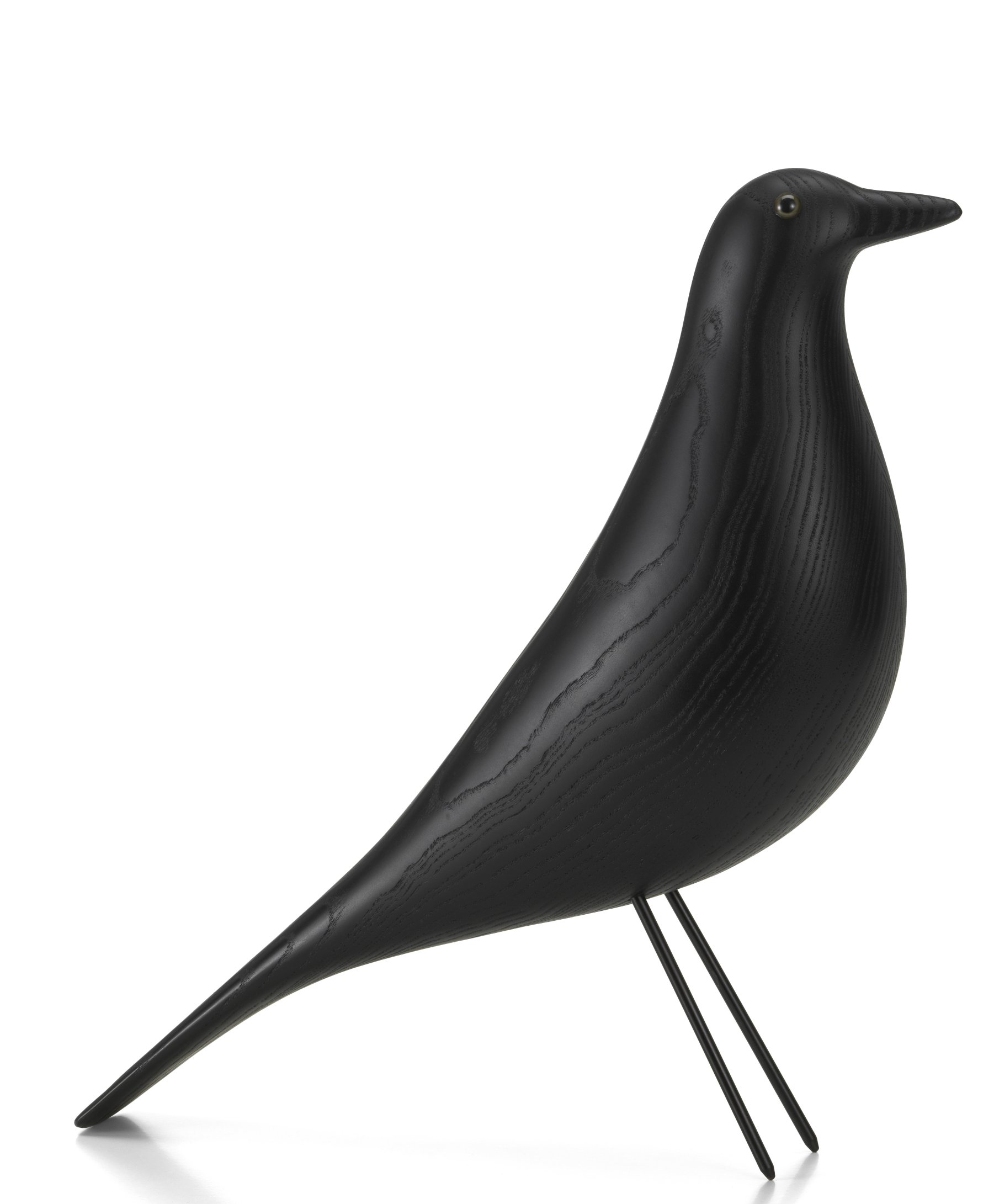 Eames House Bird von Vitra, eine dekorative Vogelskulptur aus schwarzem Eschenholz auf filigranem Drahtgestell.