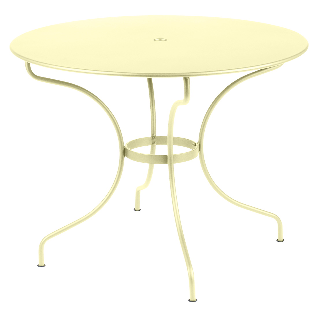 Runder, beiger Opéra+ Tisch von Fermob für den Außenbereich, ideal für Garten und Terrasse.