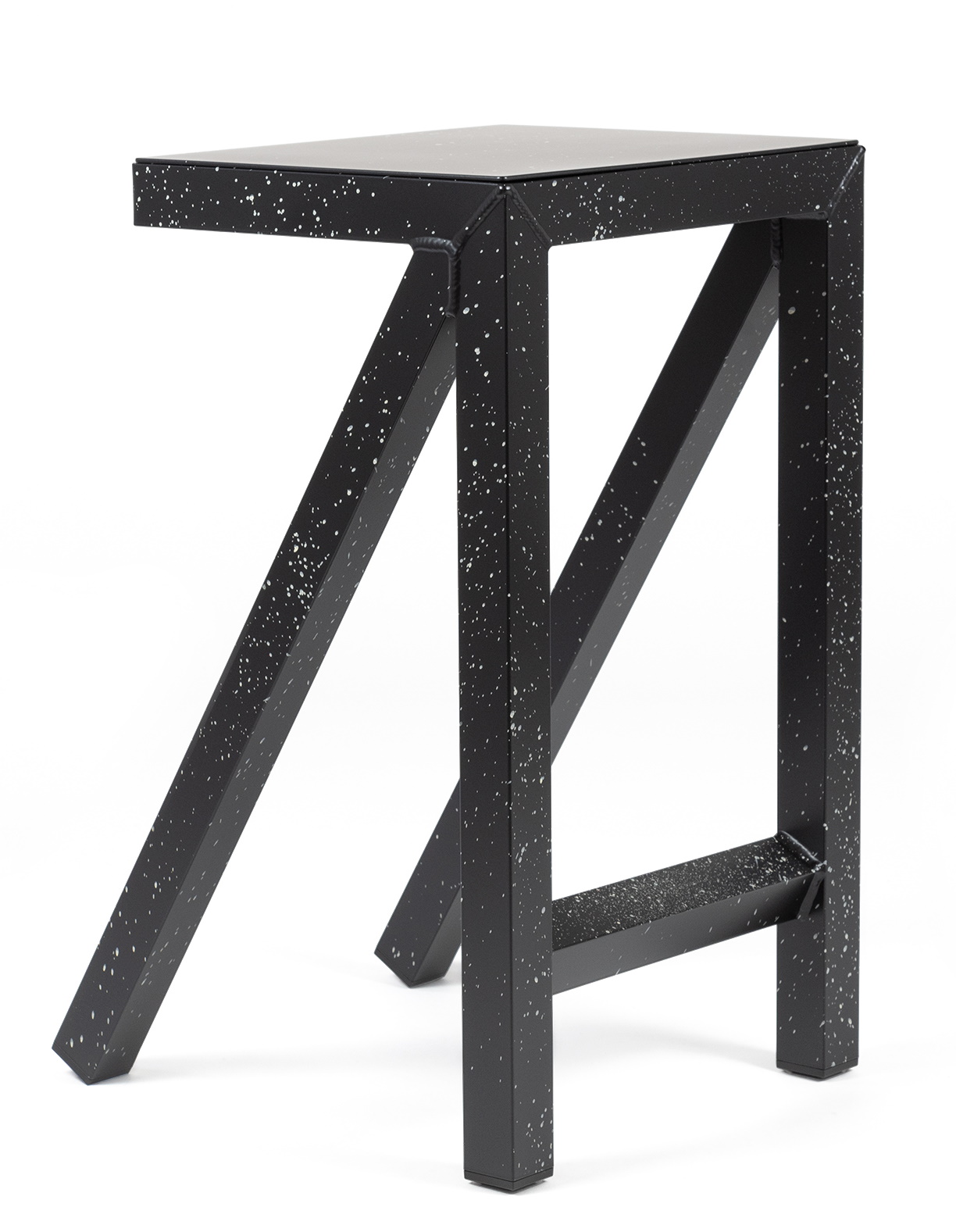Bureaurama Hocker von Magis, schwarzer Barhocker mit weiß gesprenkelter Oberfläche und geometrischem Design für moderne Einrichtung.