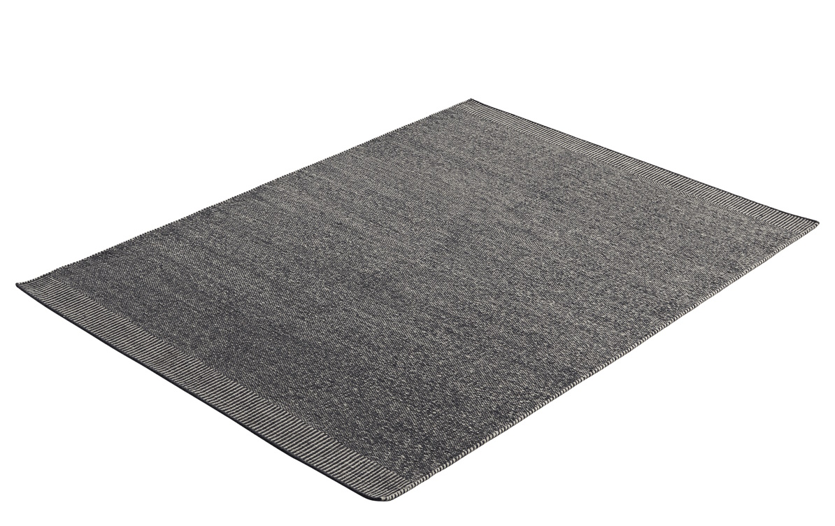 Grauer Rombo Teppich von Woud, 170x240 cm, Detailaufnahme der Textur und des Randes.