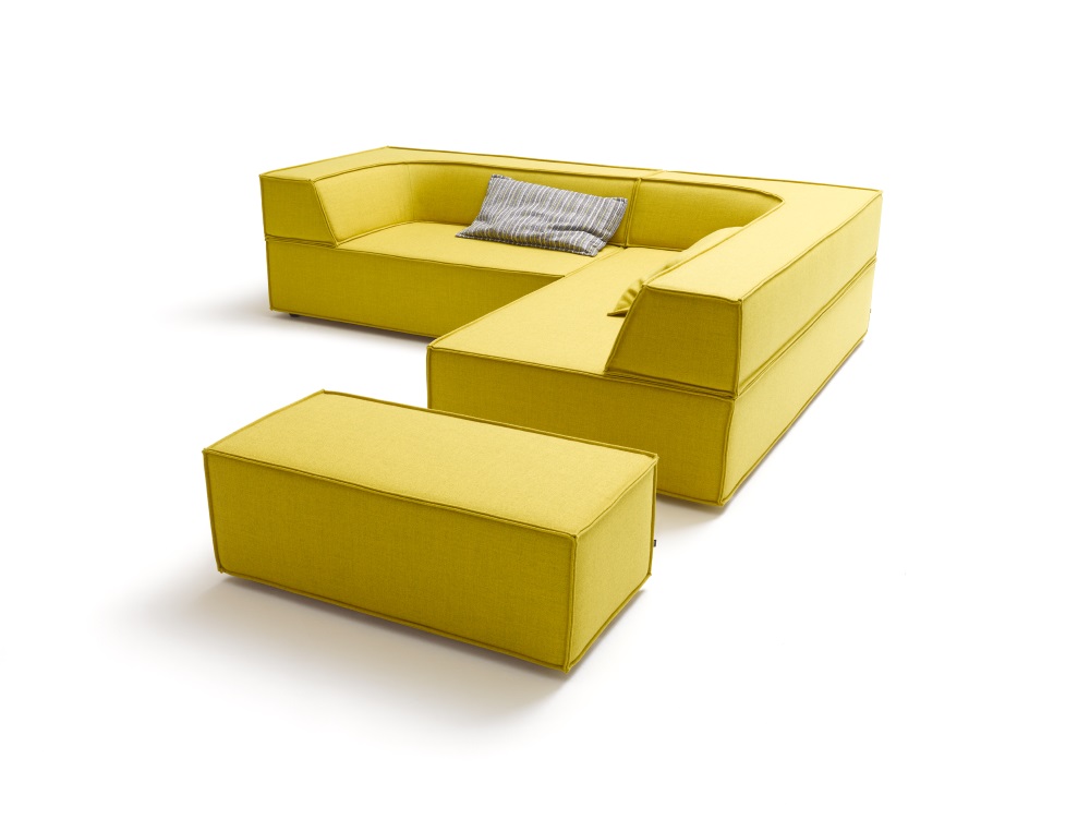 Gelbes Trio Sofa mit vier Modulen, Eckkombination rechts und einem passenden Hocker.
