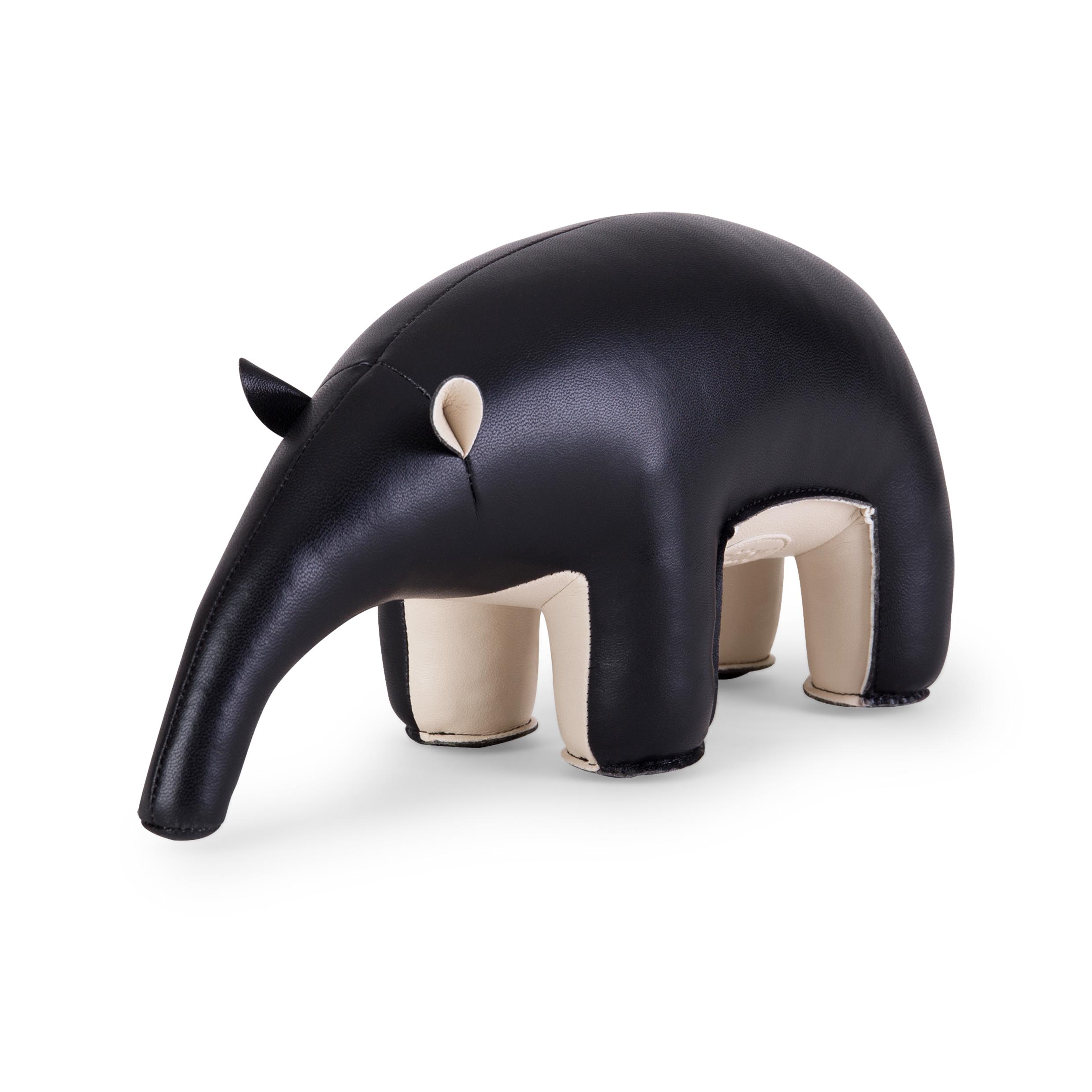 Buchstütze Ameisenbär von Züny, schwarz-weizenfarben, aus Kunstleder, dekorative Buchstütze für Kinderzimmer und Wohnbereich.