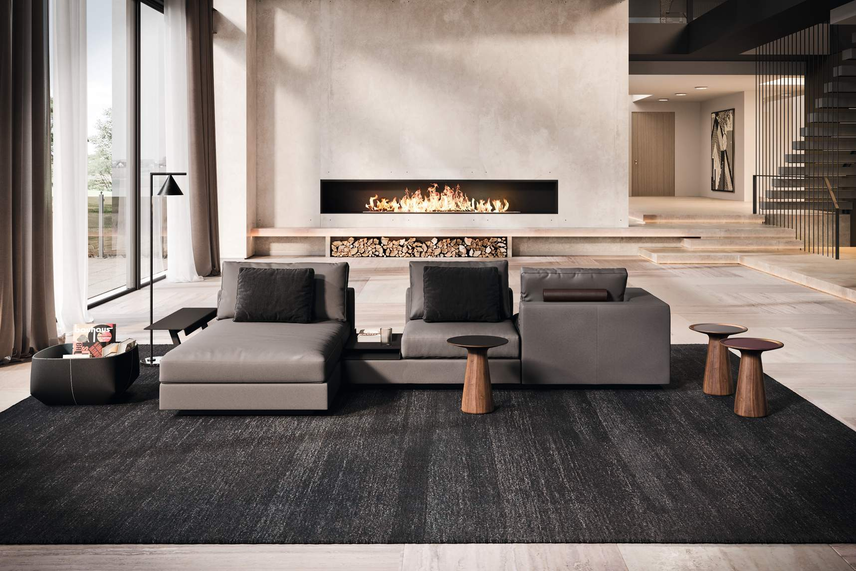 Legends of Carpets Teppich in dunklem Anthrazit im modernen Wohnzimmer mit Sofa und Kamin.
