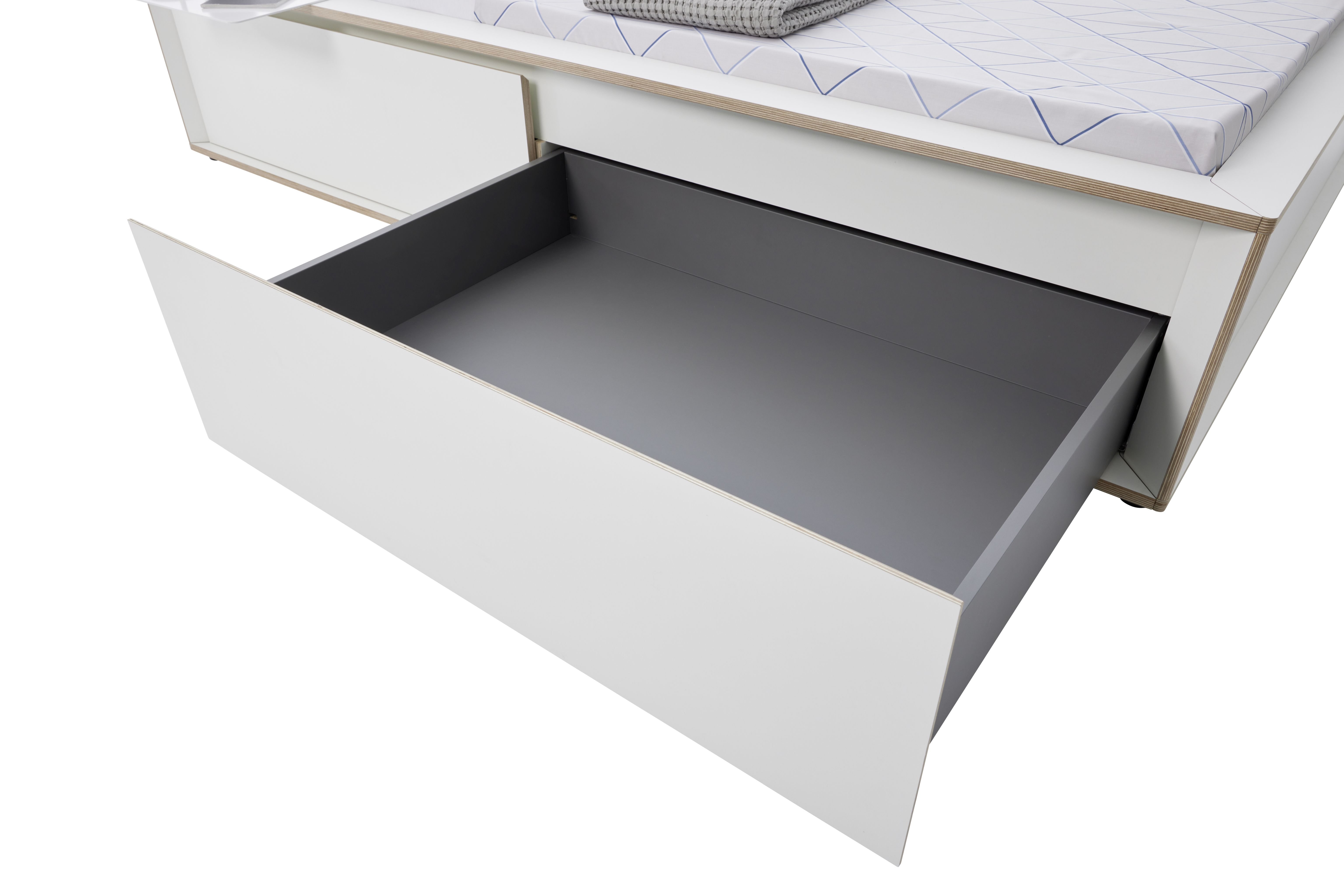 Spaze Bett von Müller Möbelwerkstätten, Detailaufnahme einer offenen Schublade, weißes modernes Design Bett mit Stauraum.