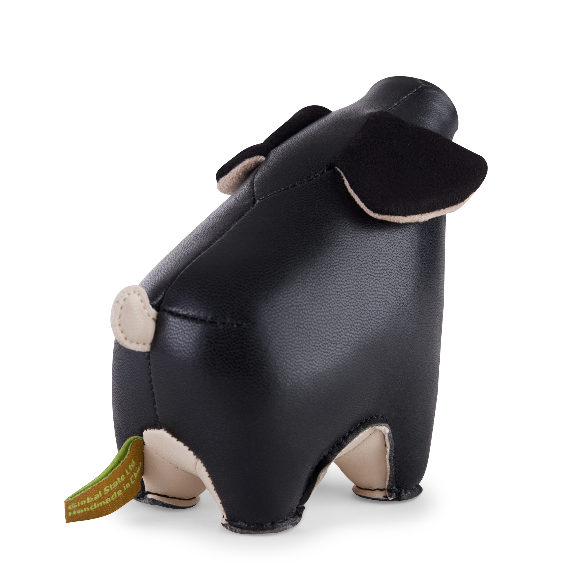 Ansicht des schwarzen Züny Schwein Briefbeschwerers. Dekoratives Accessoire für Schreibtisch und Büro.