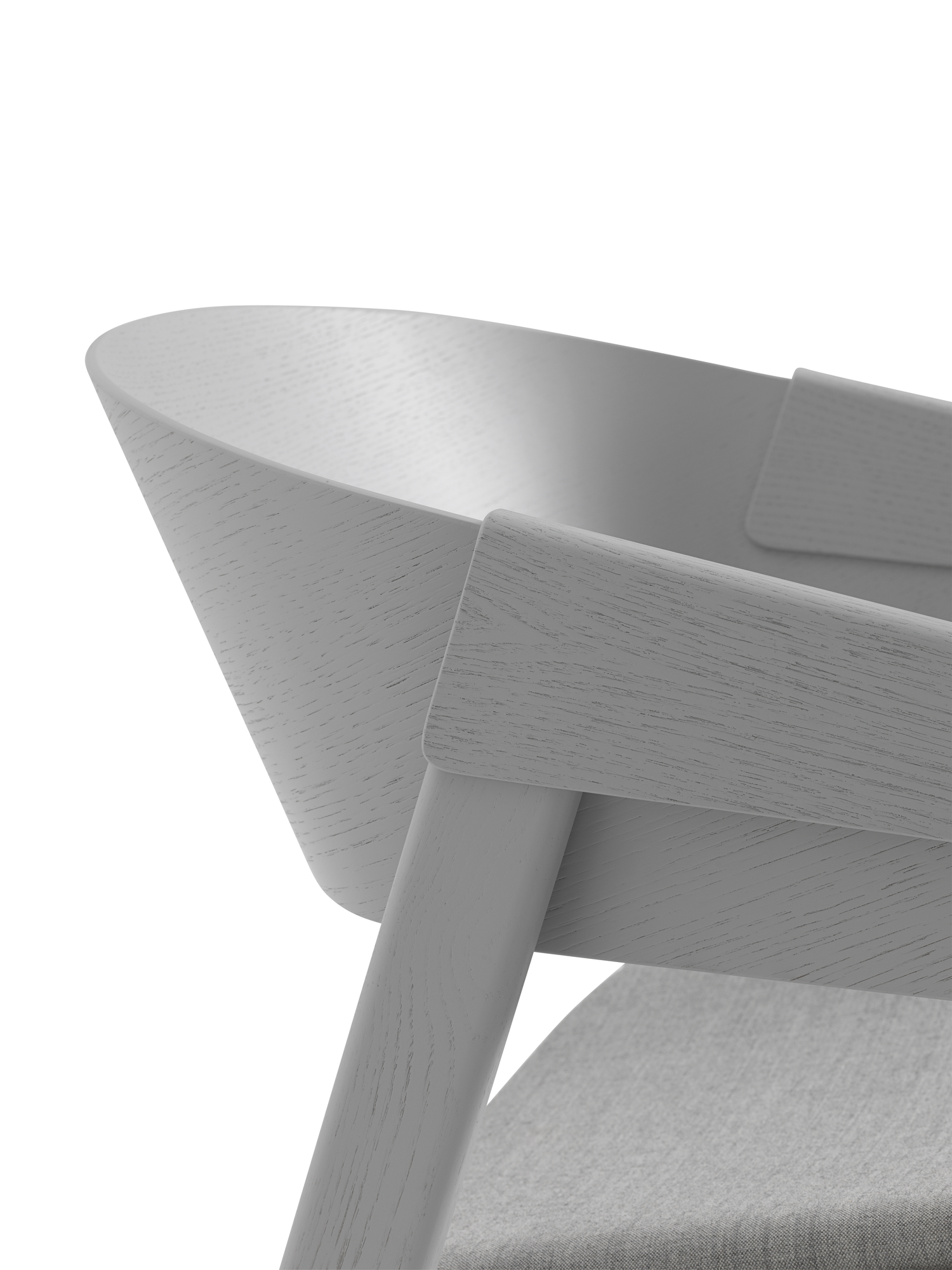 Detailaufnahme des Muuto Cover Lounge Chair Stuhls in Grau, mit Holzstruktur und Stoffbezug.