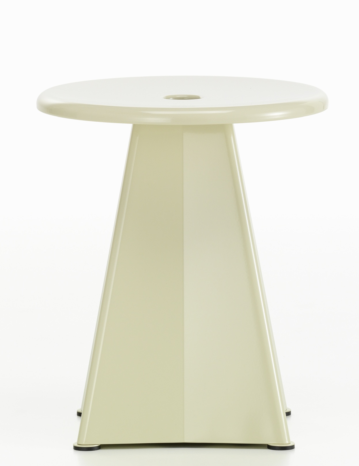 Vorderansicht des beigen Vitra Tabouret Métallique Hockers aus Metall mit runder Sitzfläche und Loch.
