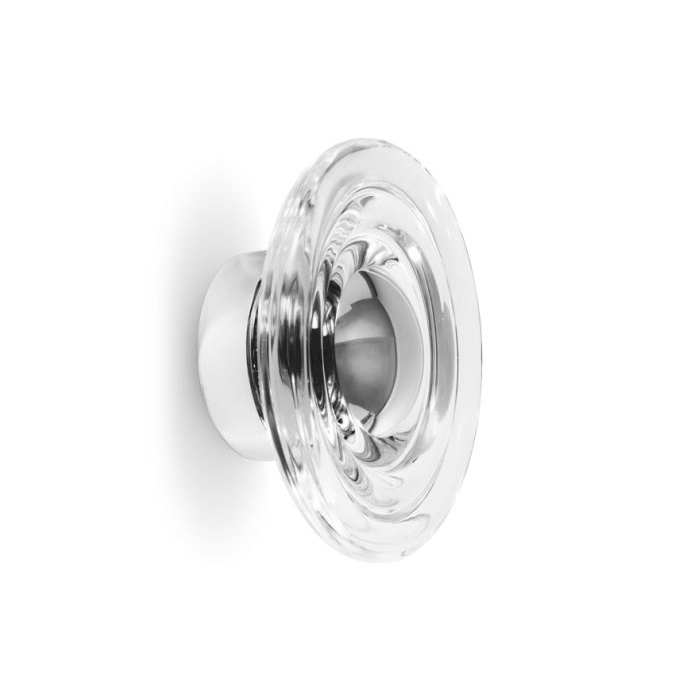 Nahaufnahme der Tom Dixon Press Surface Mini LED Wandleuchte aus klarem Glas.