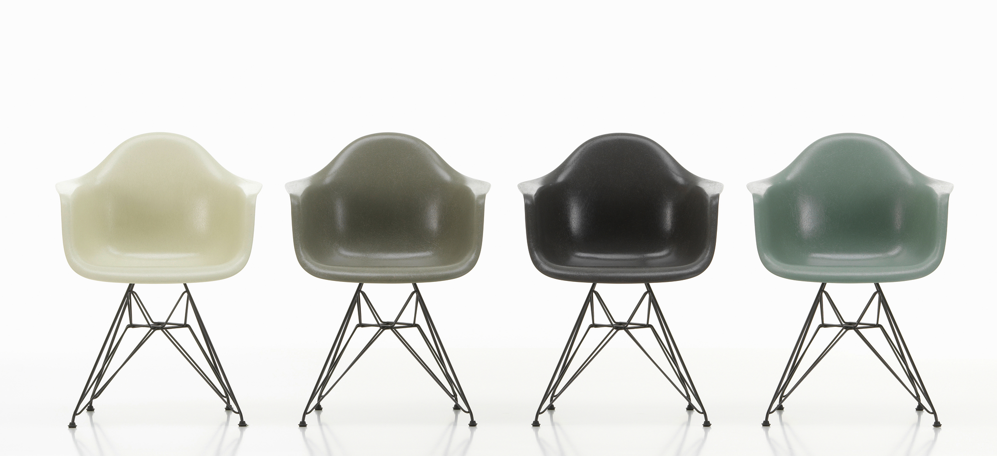 Vitra Eames Fiberglass Arm Chairs DAR in Beige, Grau, Schwarz und Grün auf Eiffel-Gestell.