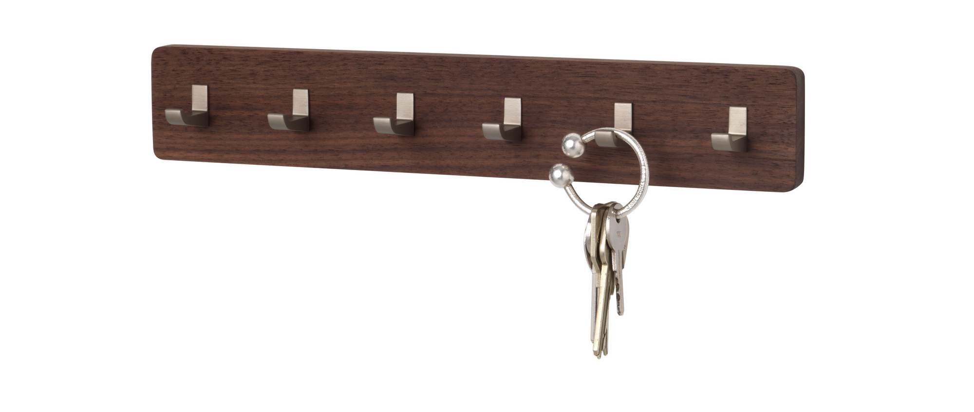 Schönbuch Key Bar Schlüsselhakenleiste aus Nussbaumholz mit sechs Haken und Schlüsselbund.