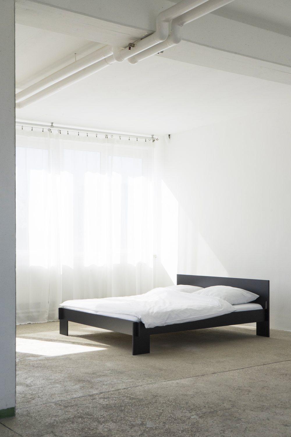 Siebenschläfer-bed met hoofdeinde van Nils Holger Moormann
