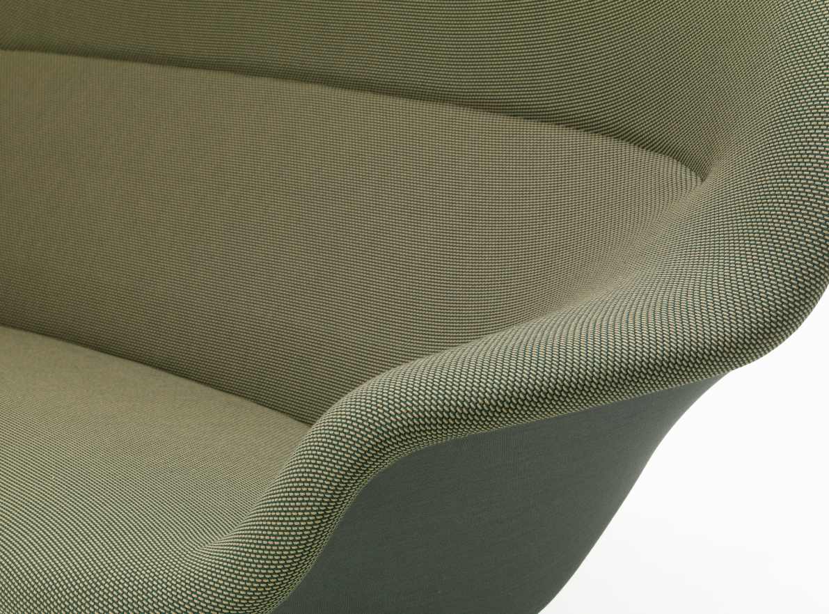 Detailaufnahme des grünen Vitra Abalon Sofas mit Fokus auf die Textur des Bezugsstoffes.