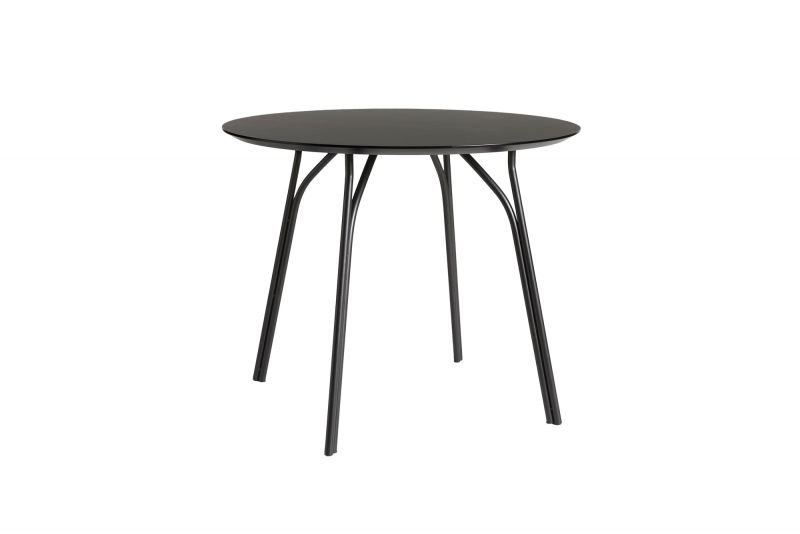 Tree Esstisch von Woud: Runder Tisch mit schwarzem Gestell und Tischplatte in Beige.