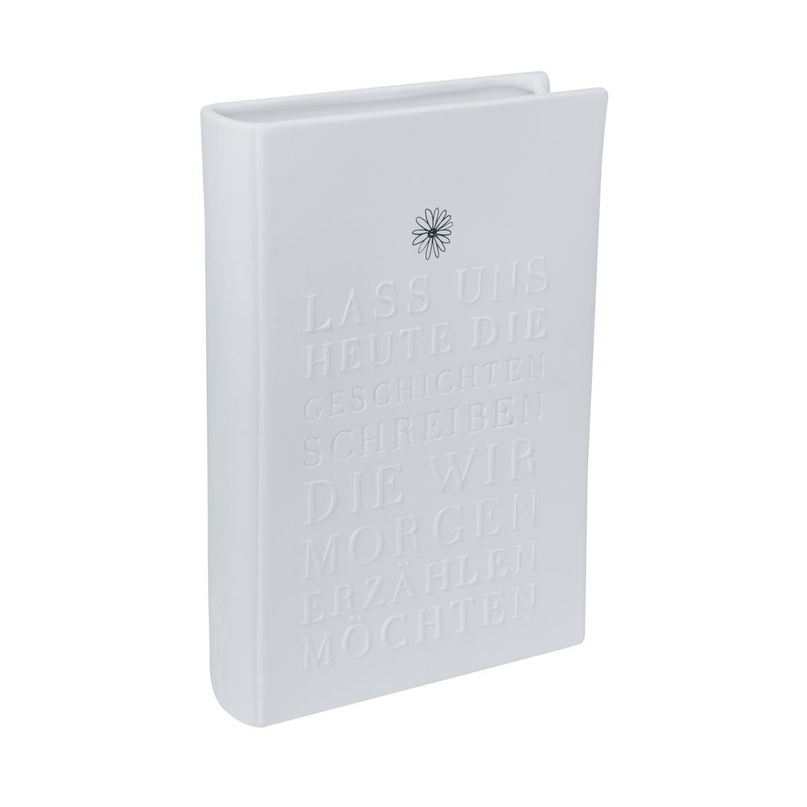 Weiße Vase in Buchform mit Aufschrift, Räder Geschichten schreiben Naturgeschichten Vase.