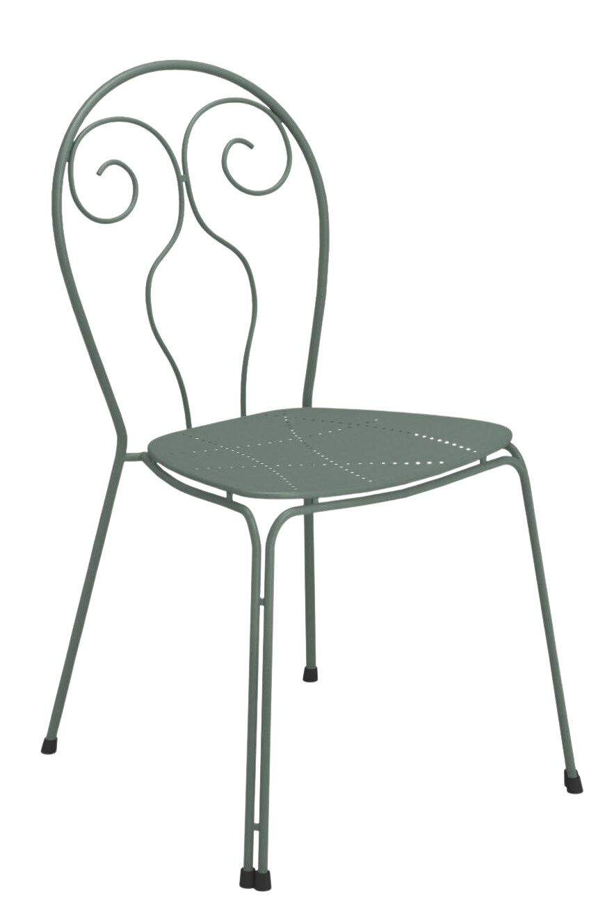 Grüner Caprera Stuhl von Emu für den Außenbereich, Metallstuhl mit Lochmuster und geschwungenem Rückendesign.