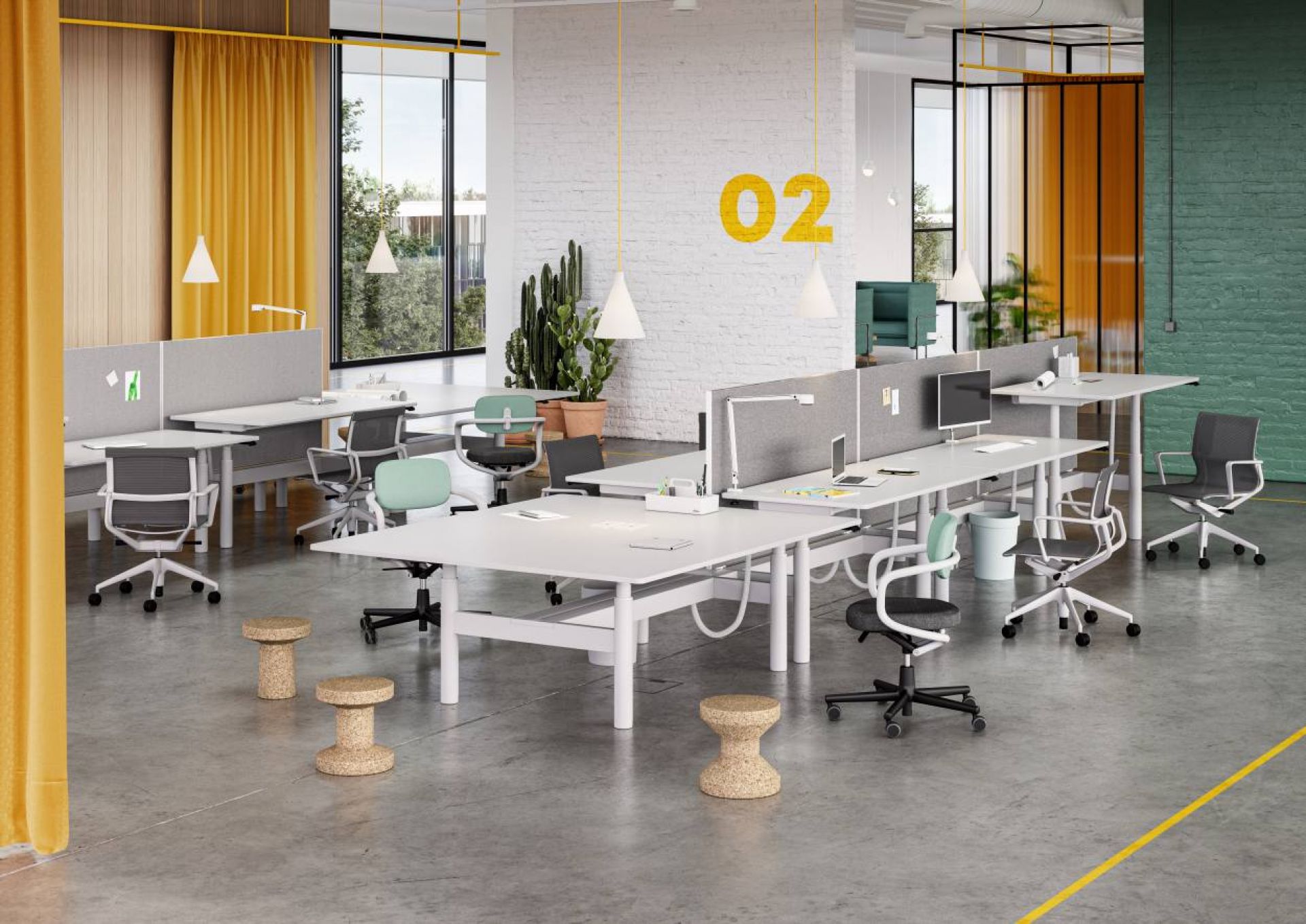 Helles Großraumbüro mit mehreren weißen Tyde Sitz- und Stehtischen von Vitra, ergonomischen Bürostühlen und Korkhockern.