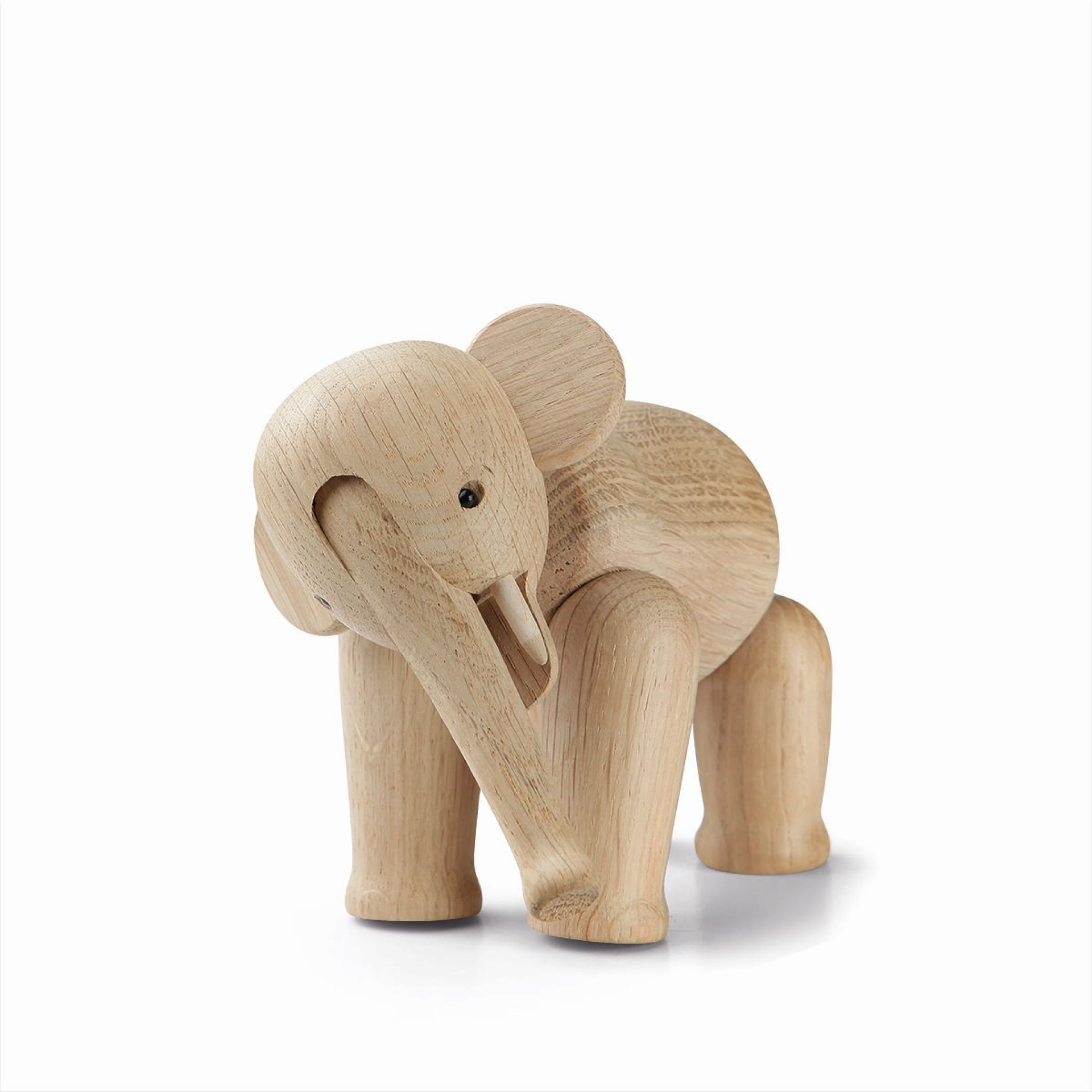 Kay Bojesen Elefant Mini Holzfigur: Detailaufnahme der dekorativen Holzfigur, helles Holz, minimalistisches Design.