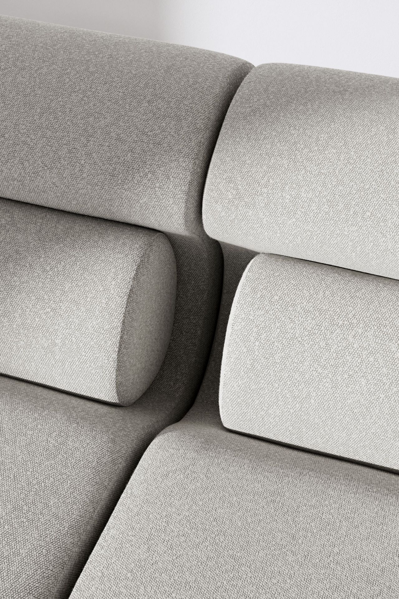 Detailaufnahme des OLA Sofa Pouf OUT in hellgrauem Stoff, modulare Sitzgelegenheit für Wohnzimmer und Lounge.