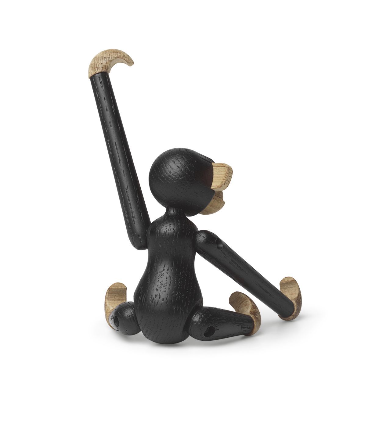 Affe Mini Holzfigur Kay Bojesen aus dunkler Eiche, sitzend, Arm angehoben.