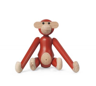 Sitzender, roter Kay Bojesen Affe aus Holz, eine dekorative Mini Holzfigur für Kinder.