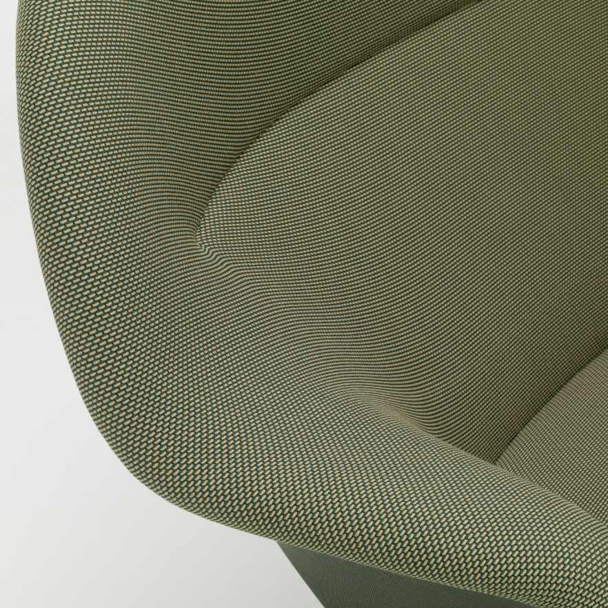 Detailaufnahme des grünen Abalon Sofas von Vitra mit hochwertigem Stoffbezug und komfortabler Polsterung.