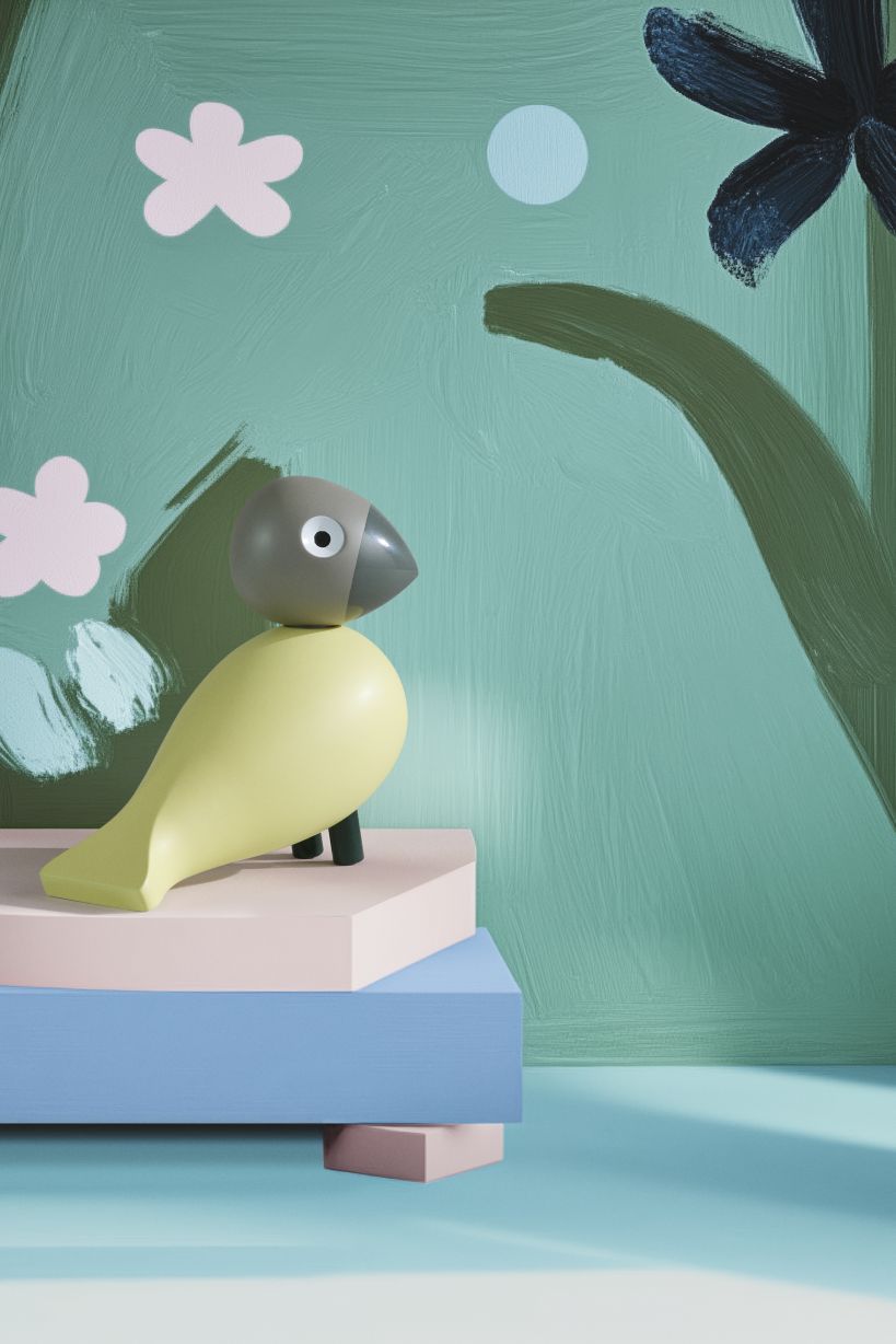 Year Bird Bella 2025 von Kay Bojesen, eine dekorative Holzfigur in Beige und Grau.