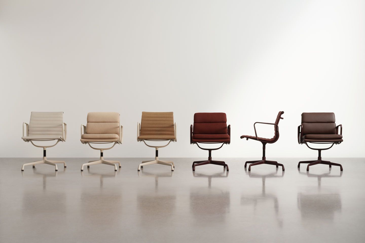 Reihe von sechs Vitra Soft Pad Chairs EA207 in verschiedenen Farben und Materialien.