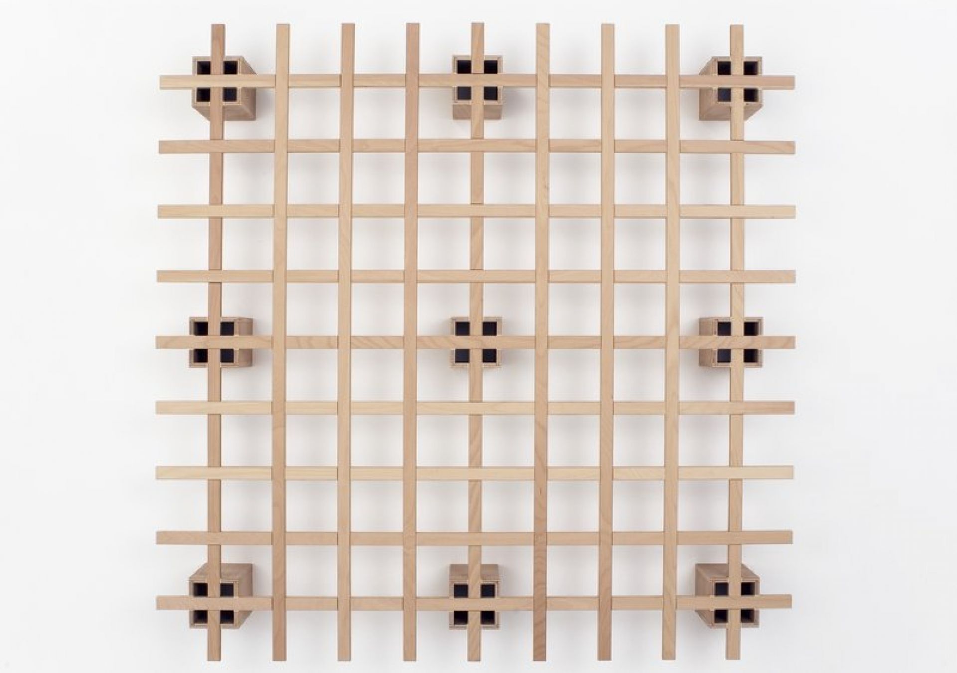 Tojo System Bett Cube  Lattenrost aus hellem Holz, minimalistisches Design für moderne Schlafzimmer.
