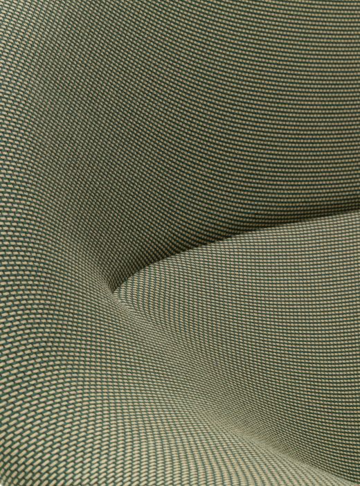 Detailaufnahme des grünen Stoffbezugs vom Abalon Sofa der Marke Vitra.