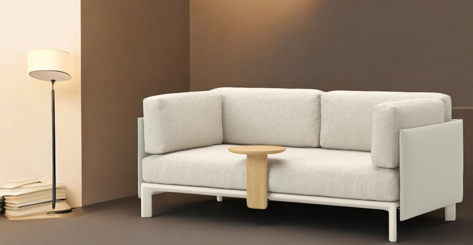 Anagram 2-Sitzer Sofa von Vitra in heller Stoffausführung mit kleinem Holztisch und Stehlampe.