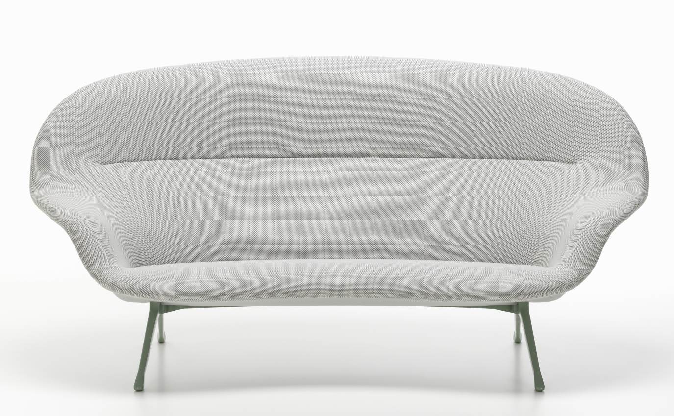 Vitra Abalon Sofa in hellgrauem Stoffbezug mit filigranem, grünem Metallgestell vor neutralem Hintergrund.