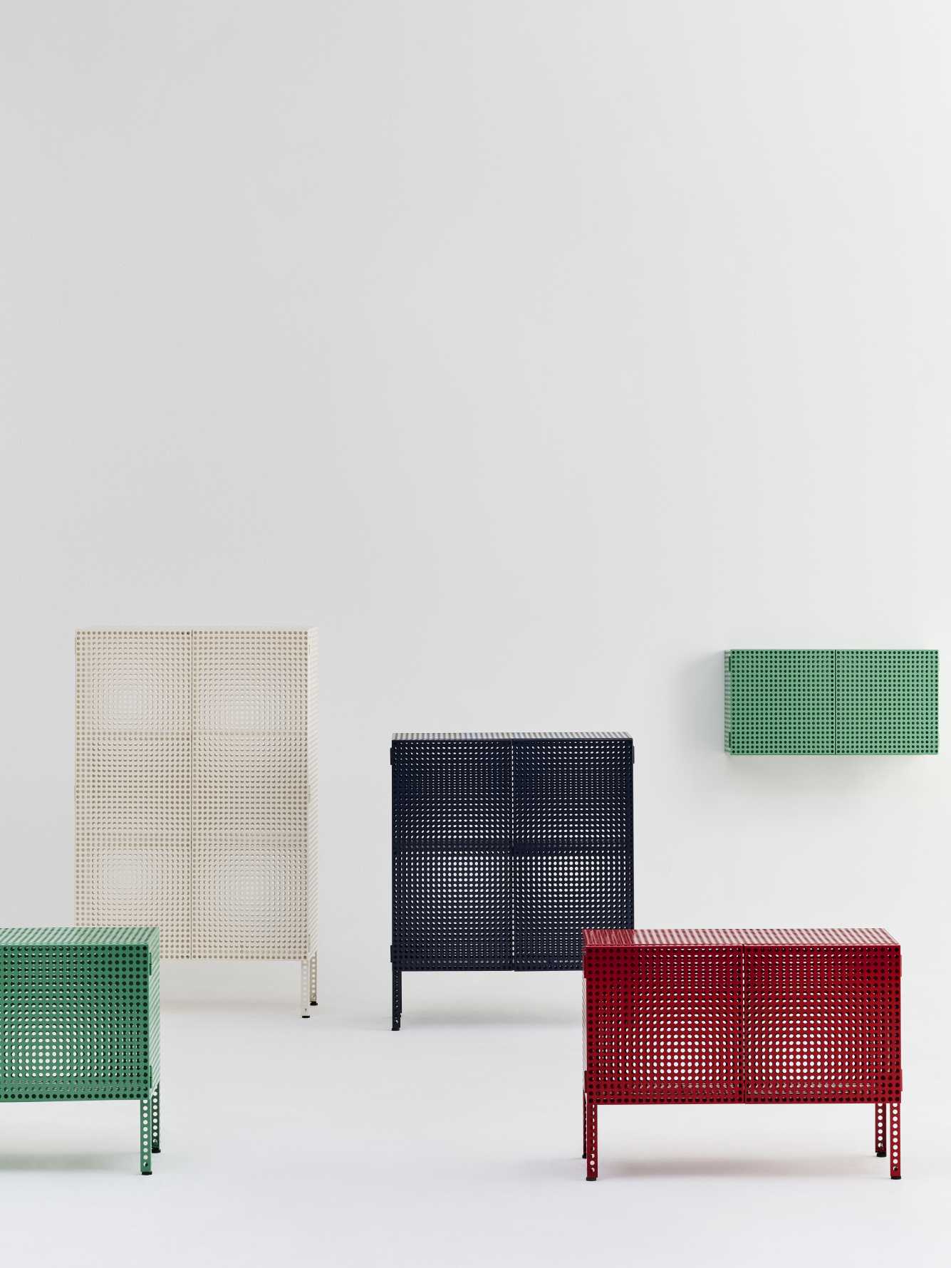 Mehrere farbige Hay Sideboards der Perforated Cabinet Serie mit gelochten Metallwänden und Türen.