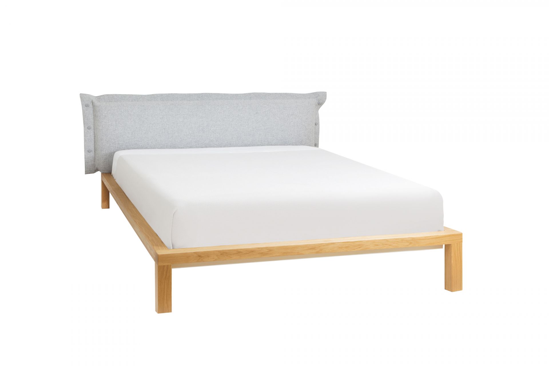 Pure Bett Eiche 180x200 mit grauem Polsterkopfteil von Hans Hansen. Modernes Eichenbett.