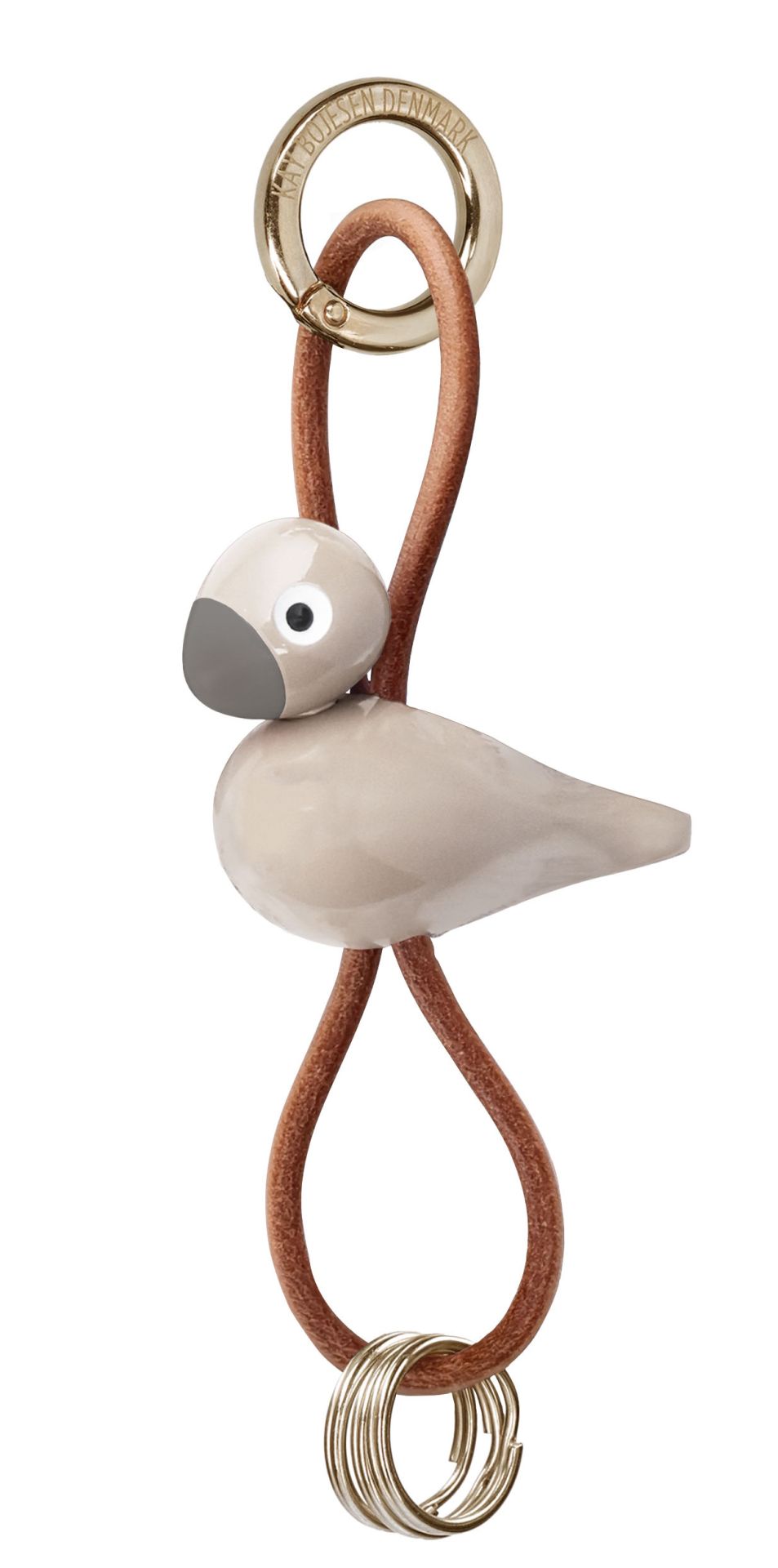 Sleutelhanger met vogelmotief in beige goudkleurig metaal met natuurlijk leer Kay Bojesen