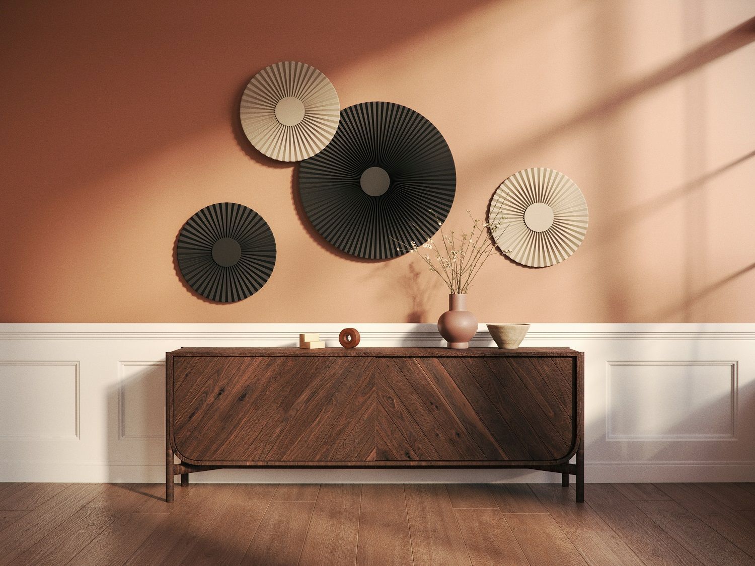 Wanddekoration mit Hartô Carmen Wandleuchten, runden Lampen in Schwarz und Beige an farbiger Wand.