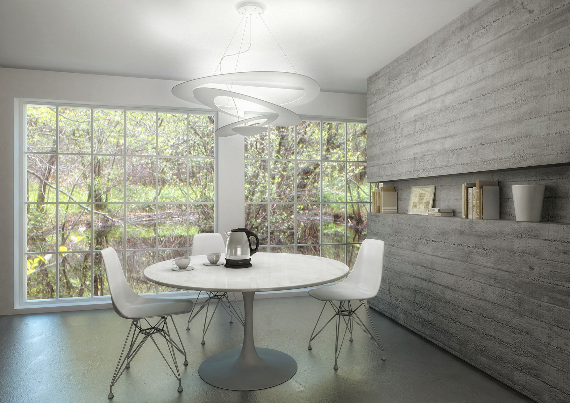 Esszimmer mit weißer Pirce Pendelleuchte von Artemide, modernem Design und angenehmer Beleuchtung.